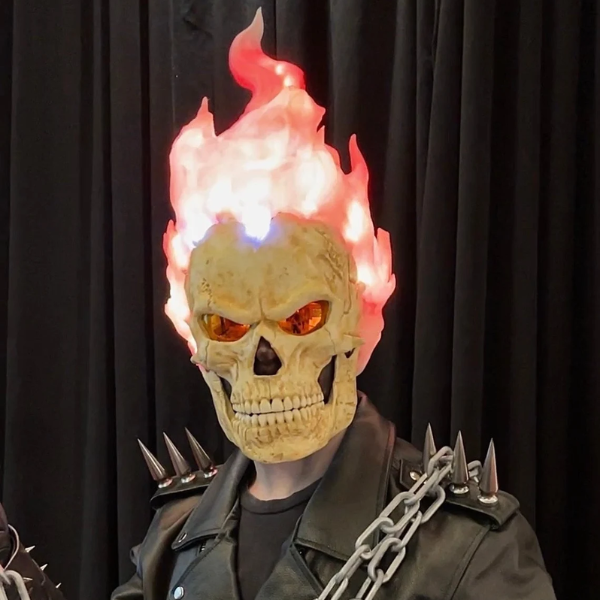 Skull mask with hair made of fire and night-vision eyes.